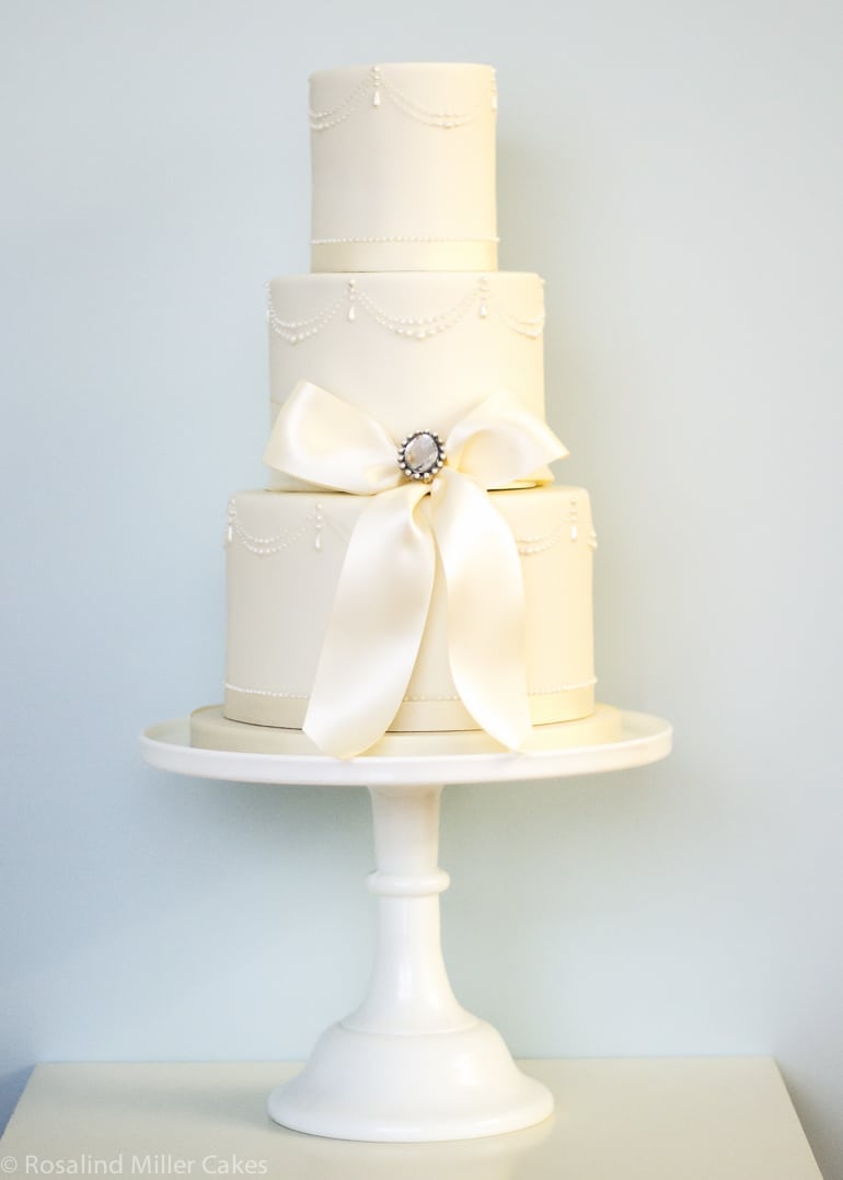 Pearls and Drapes Wedding Cake