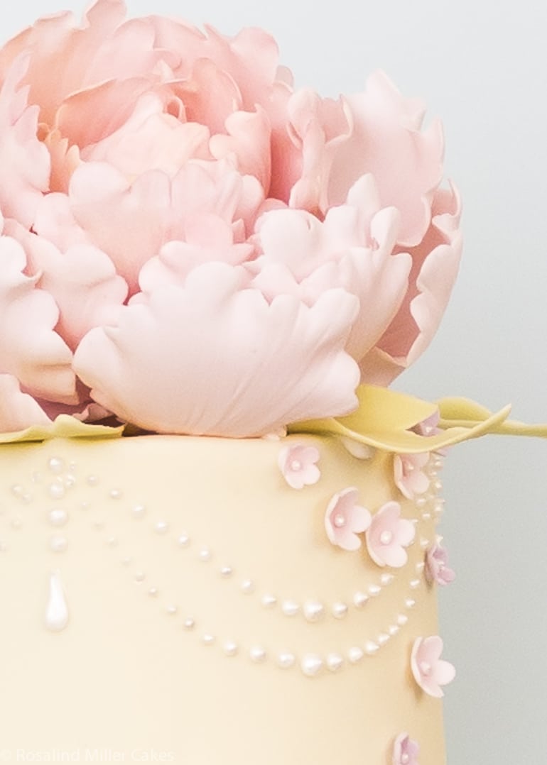 Peonies, Pearls and Drapes Wedding Cake in Pale Yellow and Pink