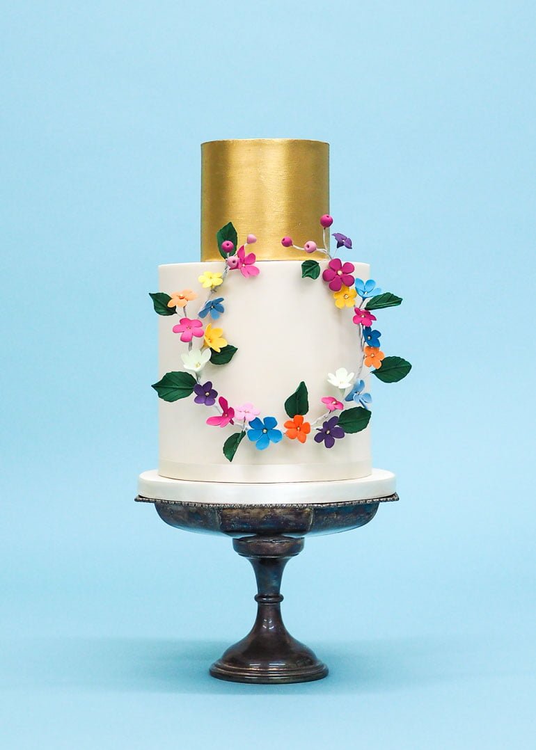 The Frida Collection Rainbow Garland Wedding Cake by Rosalind Miller Cakes
